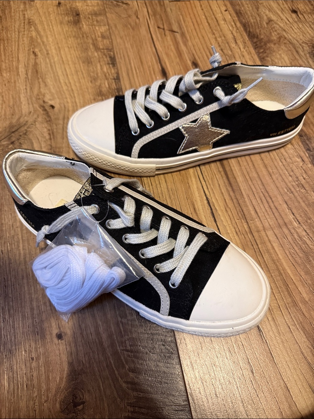 Vintage Havana Black and White Low-Top Sneakers with Gold Star